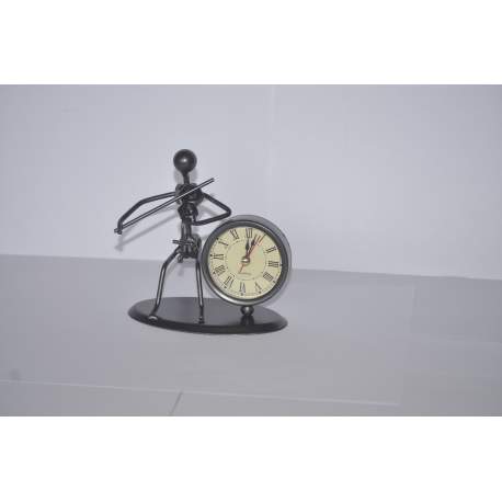 violinist sculpture with clock